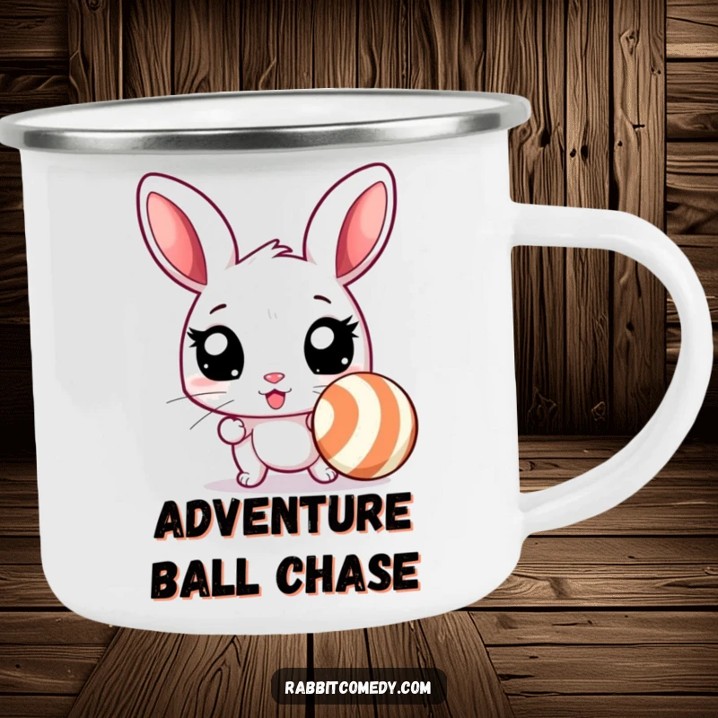 Funny rabbit camping mug showing an excited rabbit with wide eyes, ready to chase a bouncing, striped ball, ideal for humorous adventures.
