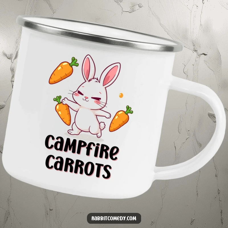 Funny rabbit camping mug featuring a rabbit character intently juggling three shiny carrots with a determined squint.