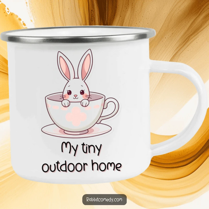 Funny rabbit camping mug with a curious bunny peeking from a giant teacup, perfect for enjoying drinks outdoors with a touch of cozy wonder.