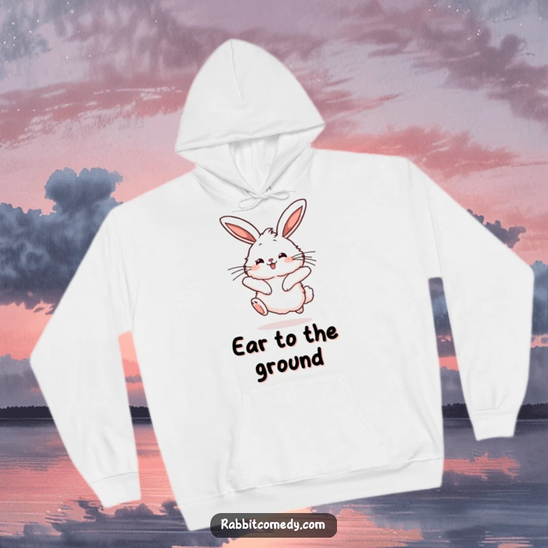 Funny rabbit hoodie depicting a fluffy character mid-hop with a joyful bounce and long ears twitching, embodying pure happiness.