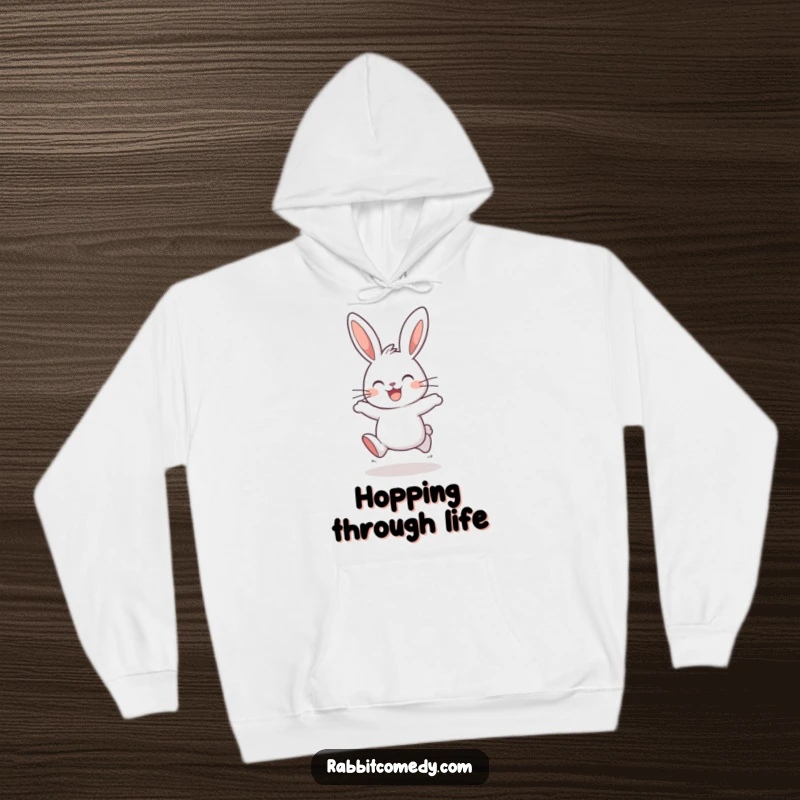 Funny rabbit hoodie featuring a happy bunny, ears up, caught in a moment of joyful hopping, bringing warmth and cheer.