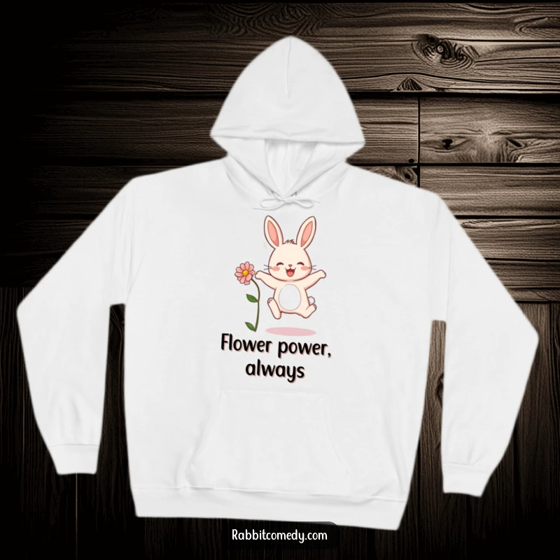 Funny rabbit hoodie depicting a joyful bunny leaping with a flower, great for casual wear and spreading smiles.