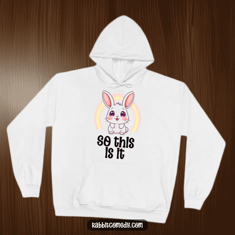 Funny hoodie showing a rabbit character with wide, amazed eyes beholding a brilliant rainbow, radiating happiness and a sense of awe.