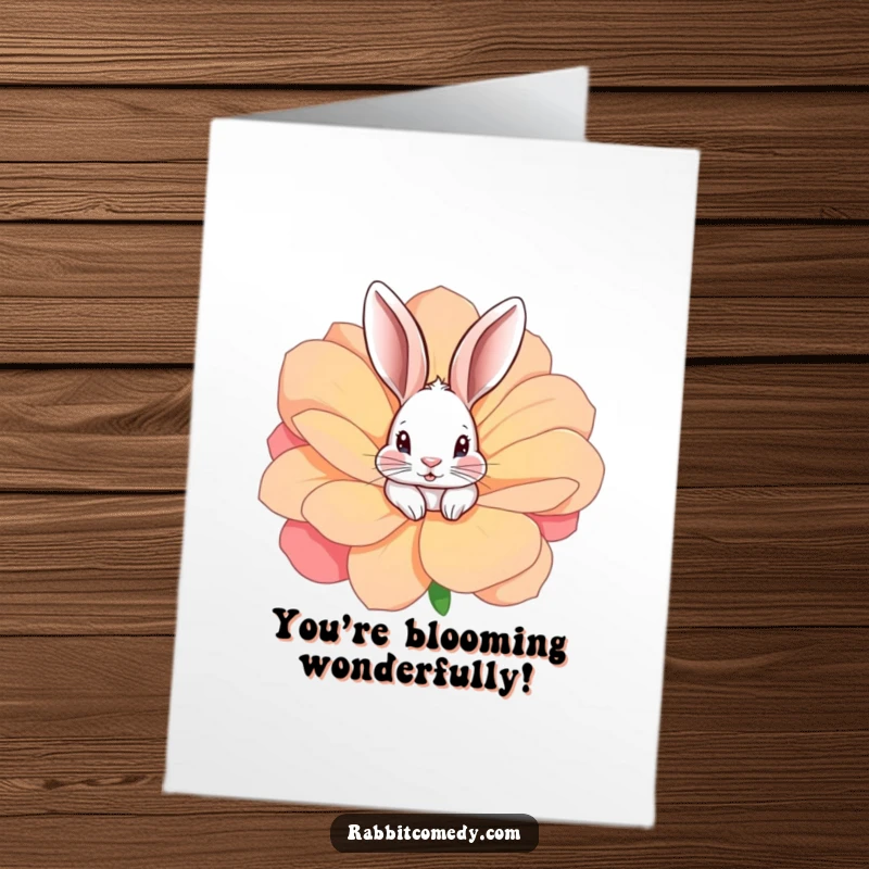 Funny free printable congratulations card with a rabbit peeking out from a large, colorful flower, symbolizing blooming success.