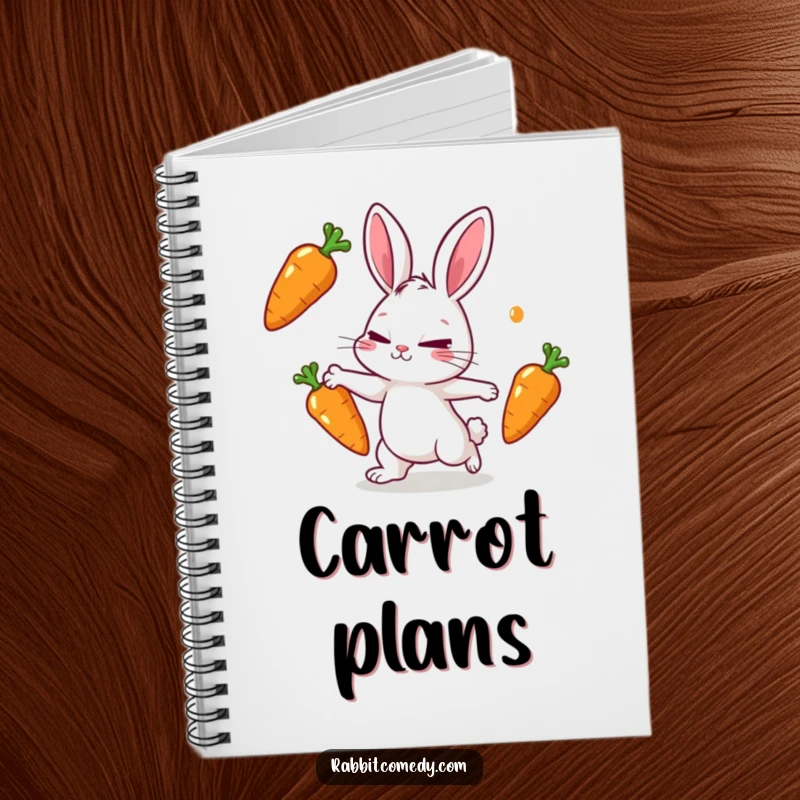 Funny rabbit notebook cover showing a rabbit character determinedly juggling three shiny carrots.