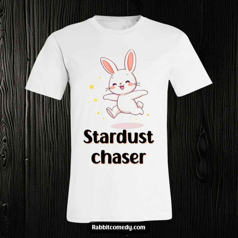 Funny rabbit t-shirt featuring a rabbit joyfully leaping, leaving a trail of shimmering star dust, with a humorous, enchanting aura.