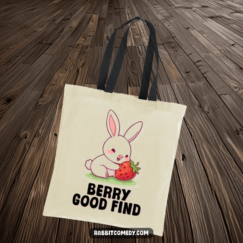 Funny tote bag with a rabbit, its nose wiggling with excitement, having just discovered a perfectly hidden, ripe strawberry.