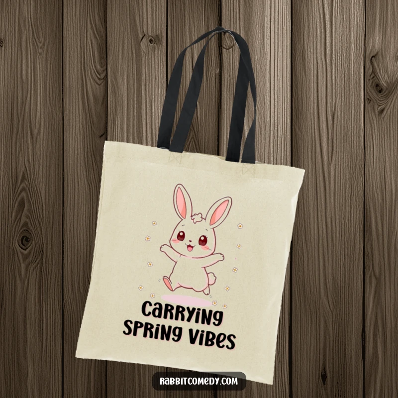 Funny rabbit tote bag featuring an excited bunny jumping and scattering flowers, ideal for carrying items with a burst of springtime cheer.