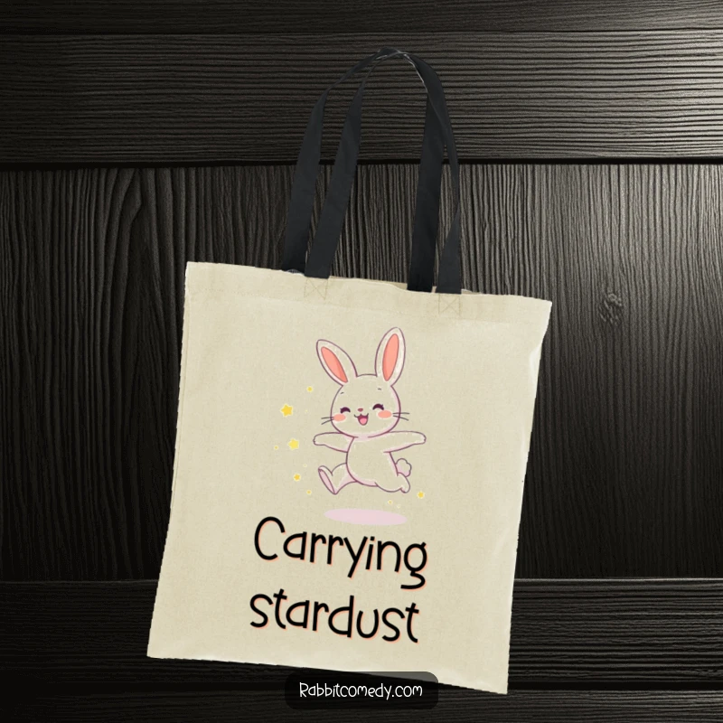 Funny rabbit tote bag featuring a rabbit joyfully leaping, leaving a trail of shimmering star dust, radiating humorous magic.