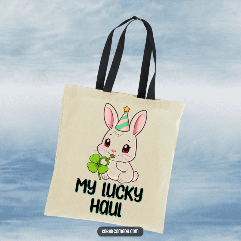 Funny Party Rabbit Tote Bag: A stylish tote bag with a rabbit celebrating in a party hat, eating clover.