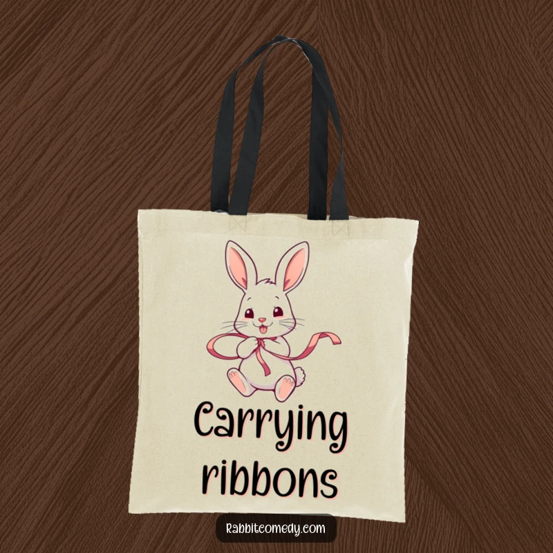 Funny rabbit enthusiastically twirling a small, colorful ribbon with its paws on a tote bag, a playful accessory